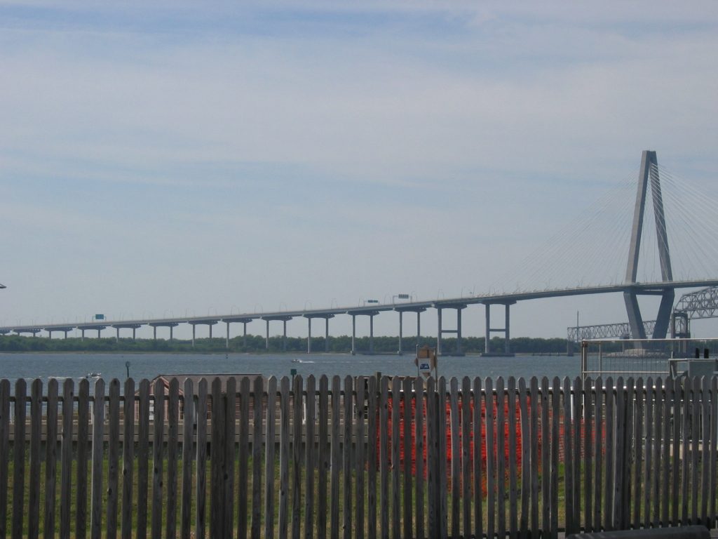 Bridge entrance with portions of the old bridge